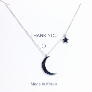 necklace with moon and star